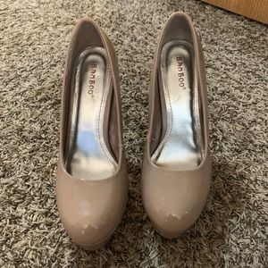 Nude patent leather heels